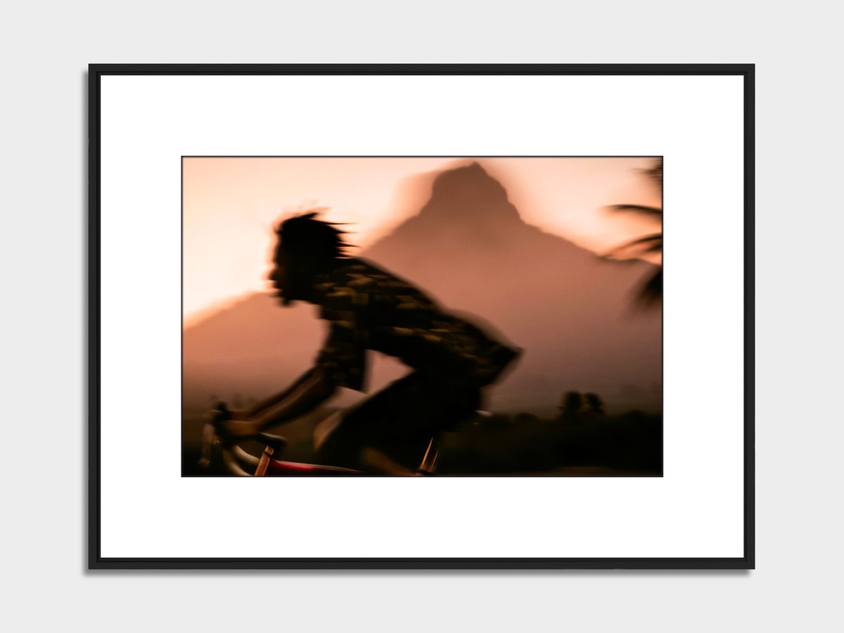 Mauritius 05 – cyclist, Cascavelle fine art print, black matt floater frame | Beau Edition