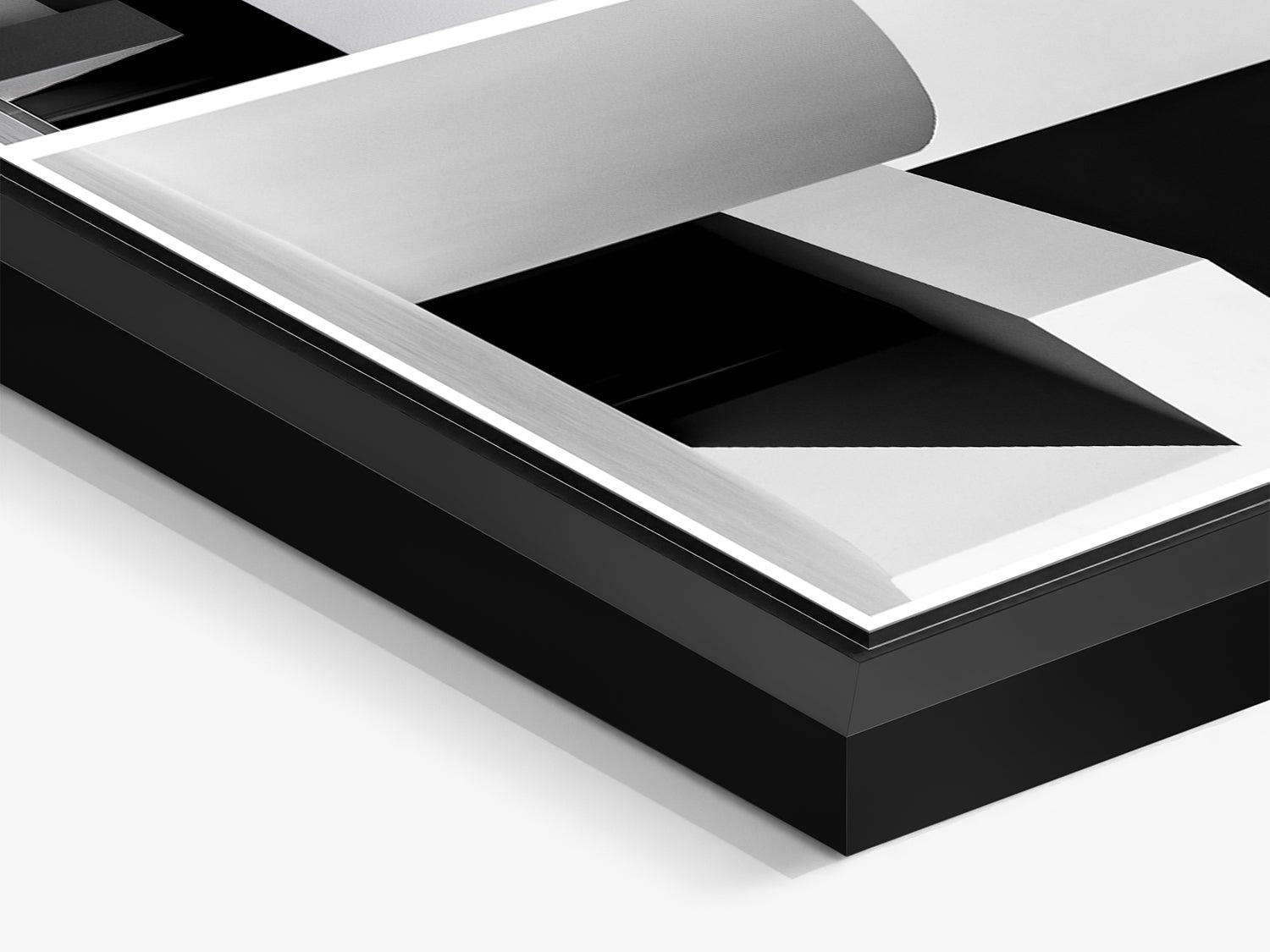 Monolith 02 – gros plan du cadre flottant noir mat, tirage photographique minéral noir et blanc | Édition Beau