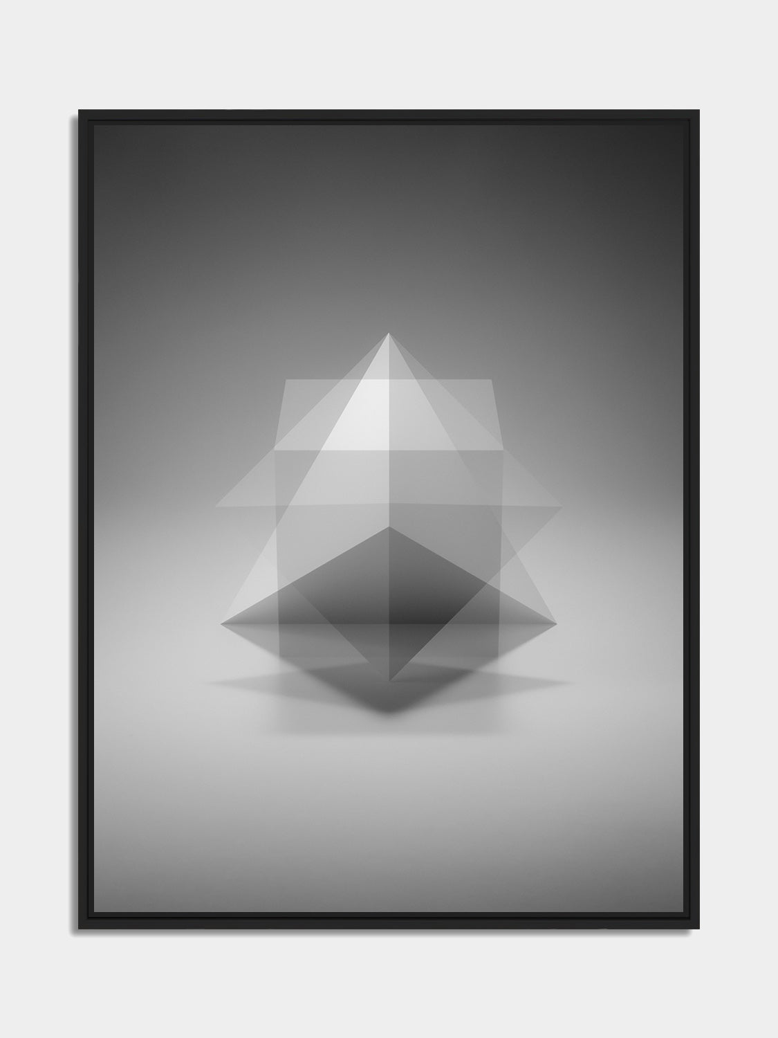 Framed double exposure print of Platonic solids, black matt floater frame, on an office wall — Beau Edition