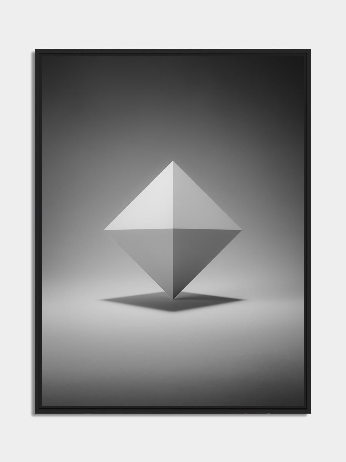 Framed octahedron print, black matt floater frame, on an office wall — Beau Edition