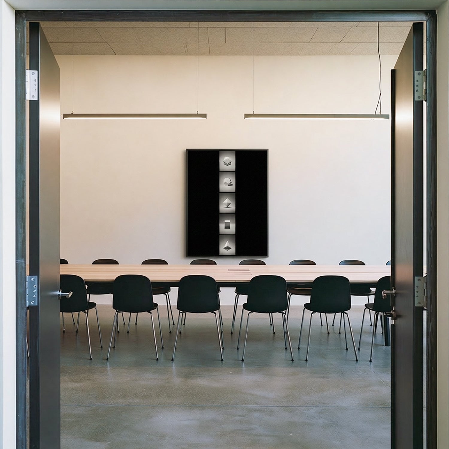 Framed Platonic solid prints in a meeting room — Beau Edition